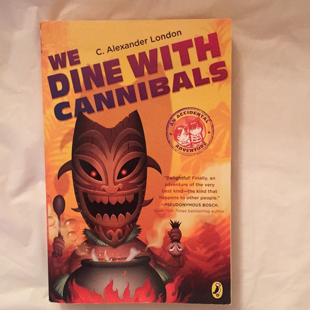 📚Book: We Dine with Cannibals - Paperback
